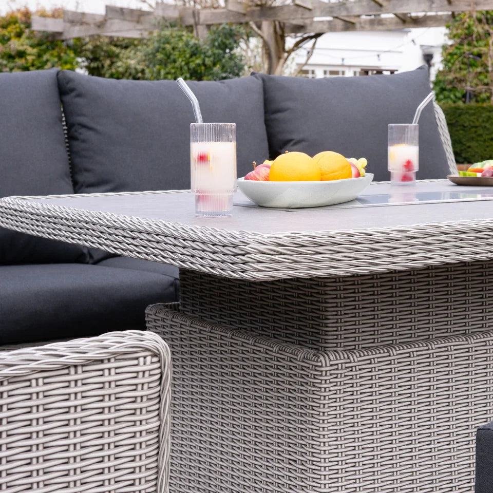 Talia L-Shaped Grande Corner Rattan Lounge Dining Set with Reclining Armchair and Bench - Left Handed Rising Gas Fire Pit Table in White Wash