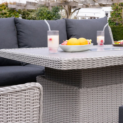 Talia L-Shaped Grande Corner Rattan Lounge Dining Set with Reclining Armchair and Bench - Left Handed Rising Gas Fire Pit Table in White Wash