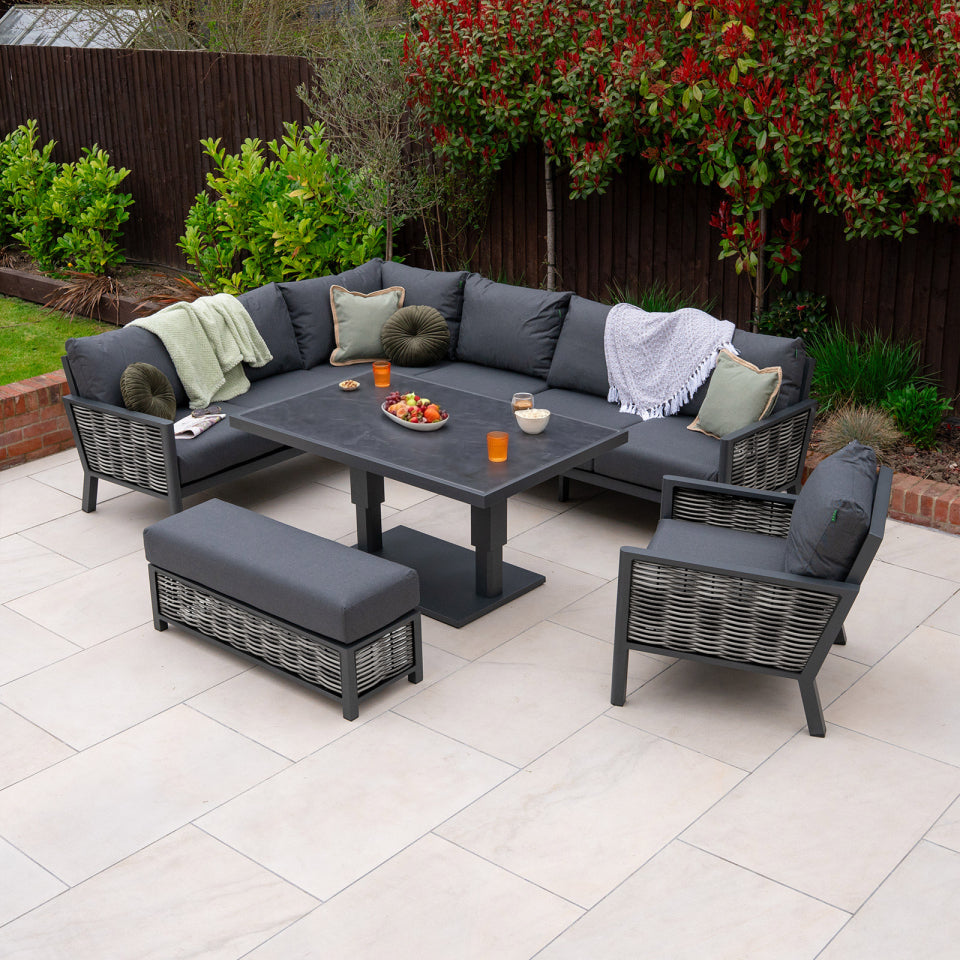 Caleb L-Shaped Corner Rattan Aluminium Lounge Dining Set with Armchair and Bench - Adjustable Rising Dark Grey Table in Dapple Grey